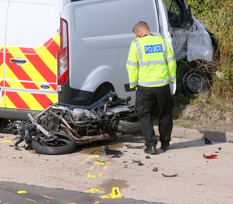 Motorcycle acciden with police officer on scene